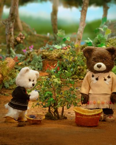 Spirit Bear Movie Still Still from Spirit Bear movie showing Spirit Bear and Mary the Bear harvesting berries