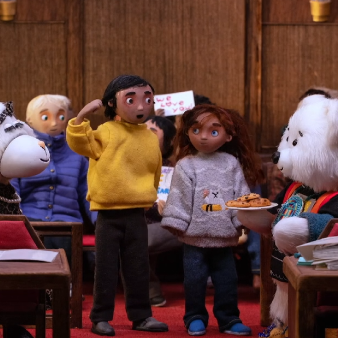 Still from Spirit Bear movie showing Spirit Bear talking to kids